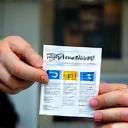 Person receiving sticker brochure